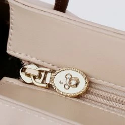 Milliotandco Disney Minnie Be Happy Sling Bag (Brown) Bags